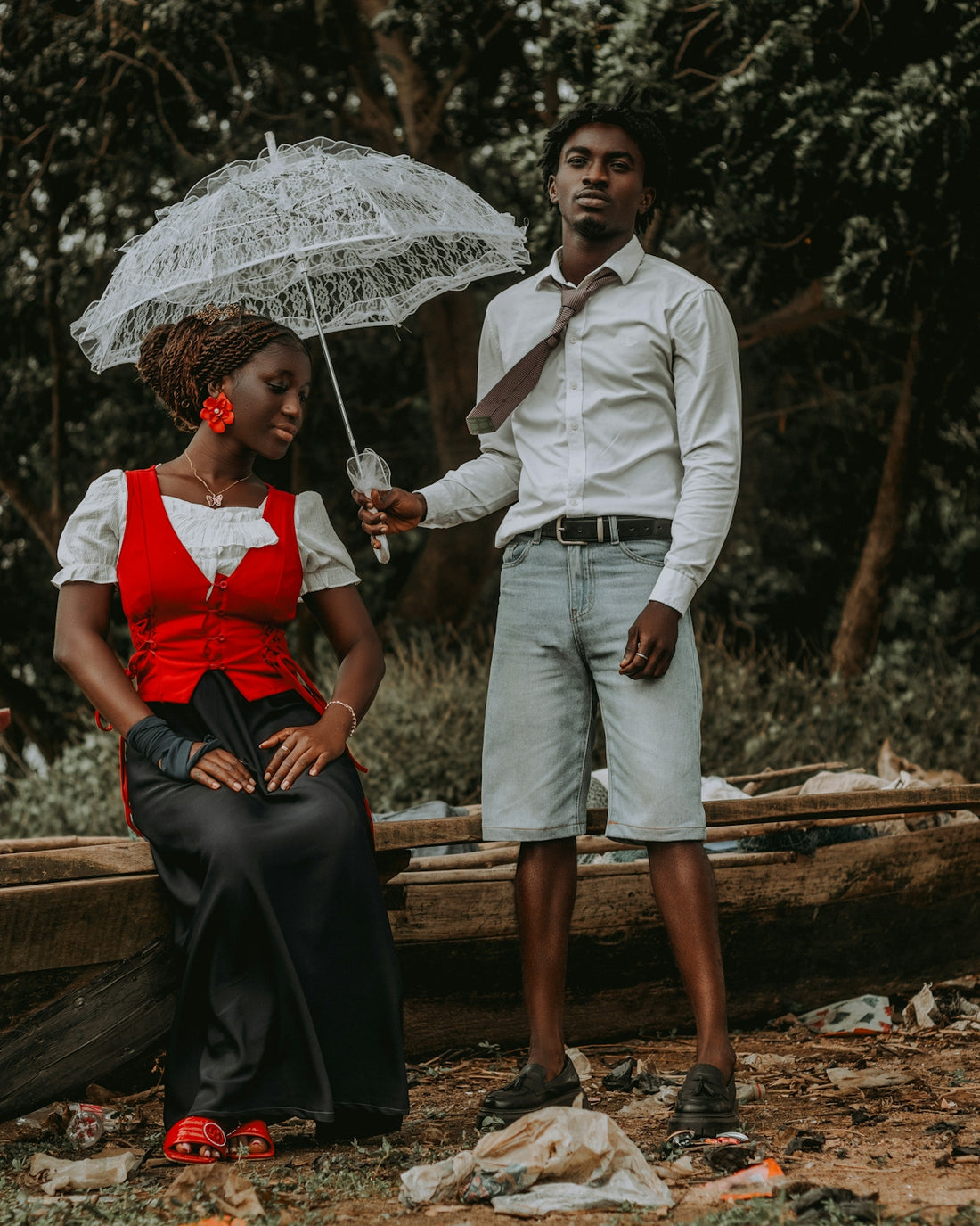 Couple with umbrella in a natural setting
